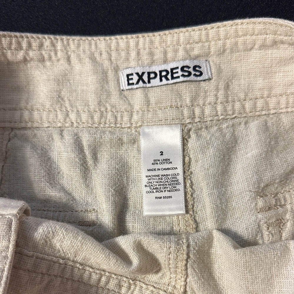 Express High Waist Cream Shorts with Button Accents - Picture 2 of 7
